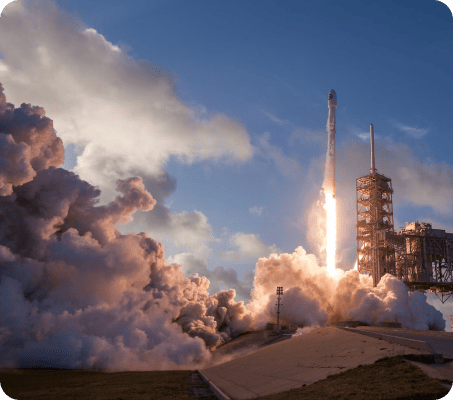 Wide shot of a rocket launch soon after takeoff